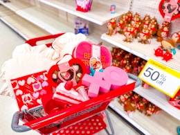 valentine's day clearance items sitting in a cart in front of target signage
