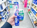 hand holding crest and oral-b walgreens