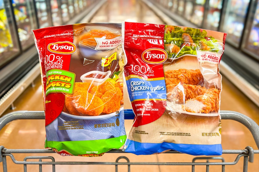 2 bags of tyson frozen chicken on a walmart cart