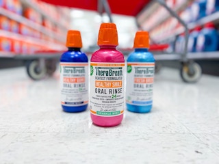 Three different varieties of Therabreath in front of a Target shopping cart