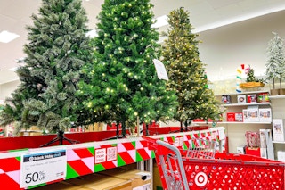 christmas trees sitting on a display at target
