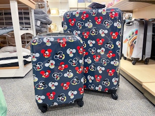 Disney Luggage Separate pieces sitting on floor