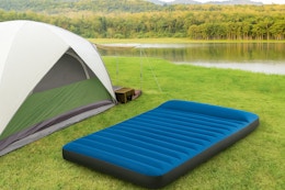 an intex air mattress near a tent