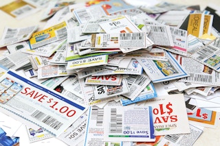 a pile of paper coupons