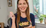 a woman eating jenny craig meals