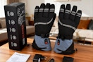 Youtelit Heated Gloves for Women Men sitting on a table.
