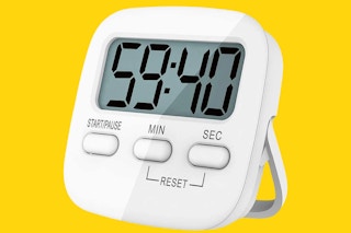 kitchen timer on a yellow background