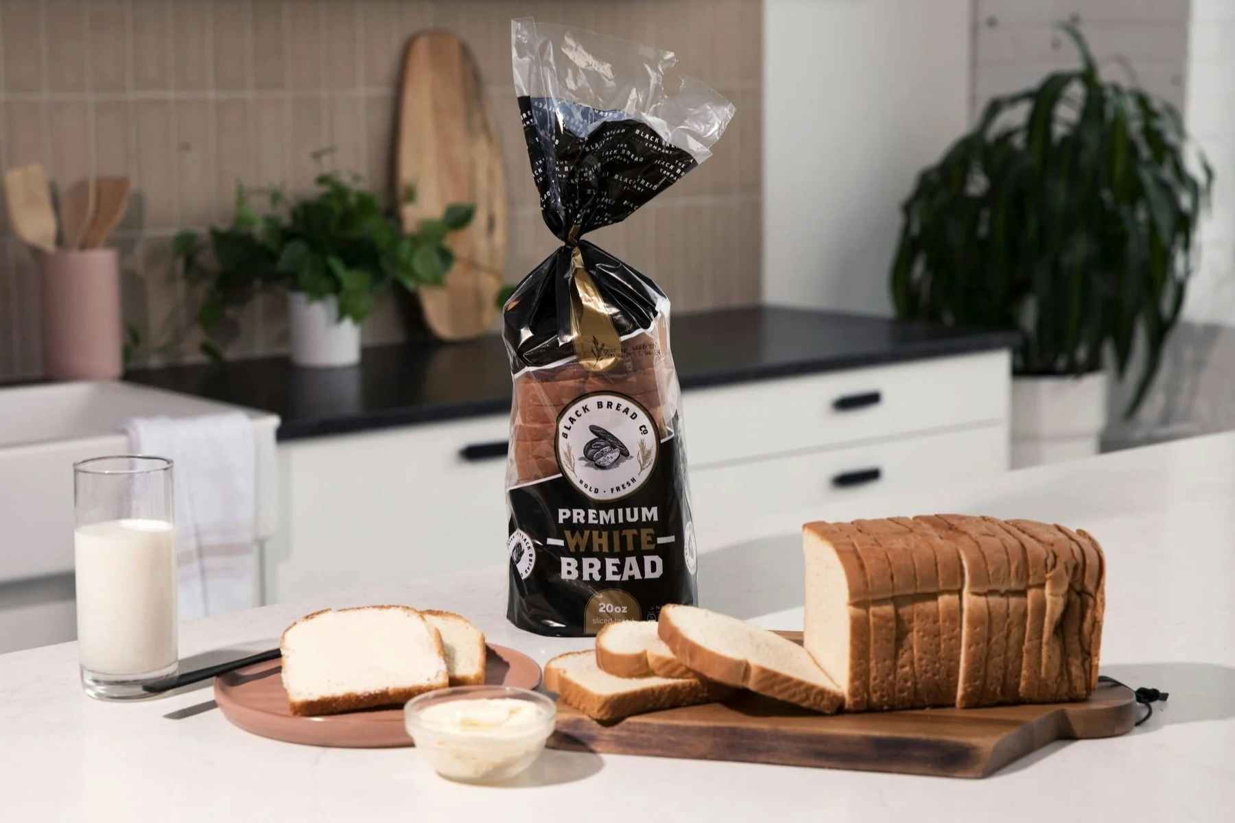 a sliced loaf of bread from Black Bread Company on a counter 