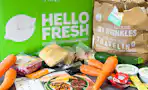 a hello fresh meal kit and ingredients on kitchen counter