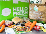 a hello fresh meal kit and ingredients on kitchen counter