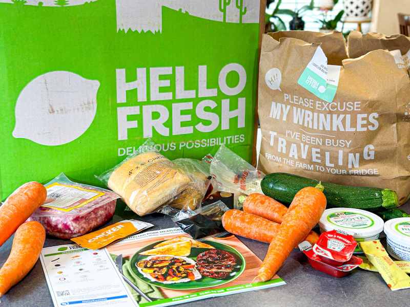 a hello fresh meal kit and ingredients on kitchen counter