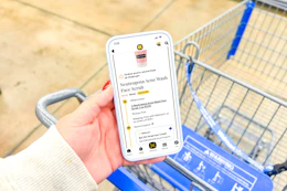 hand holding a smartphone displaying a 1-clip coupon deal in the kcl app