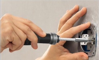 a person using a screwdriver