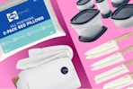 Sealy 2-pack pillows, white towel warmer, blue Rubbermaid food storage, Carote knife set