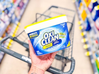 hand holding oxiclean