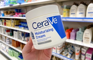 hand holding cerave moisturizing cream
