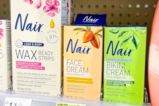 three boxes of nair hair removal products on a store shelf