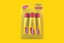 a pack of lip balm on a yellow background 