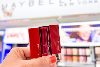 hand holding three maybelline color sensational lip sticks
