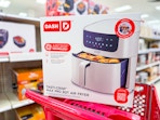dash xl air fryer sitting on a target cart