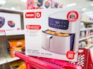 dash pro max 8-quart air fryer sitting on top a target cart