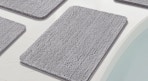 a grey chenille rug 