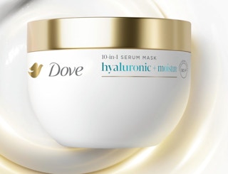 a white and gold jar