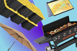 Sterilite storage, patio umbrella, Blackstone griddle, and HP laptop