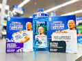 two packages of Mr. Clean Magic Erasers and one bottle of Mr. Clean multi-surface cleaner