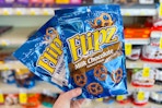 hand holding flipz pretzels cvs