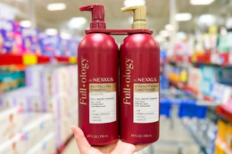 hand holding nexxus hair care