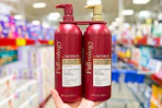 hand holding nexxus hair care