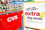 cvs extra big deals sign and hand cart