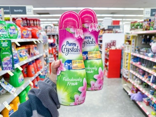 hand holding purex crystals in walgreens