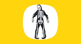 a child in a skeleton costume