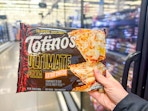 Totino's Ultimate Pizza held up in frozen pizza aisle at Walmart