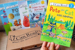 Holding up a book with a box of options