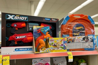 various clearance toys on shelf with 60% tag underneath
