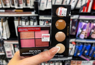 revlon eye cosmetics held in hand