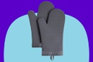 KitchenAid oven mitt on a blue background.