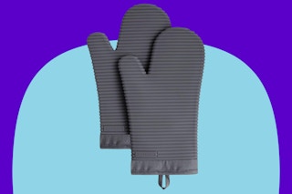 KitchenAid oven mitt on a blue background.