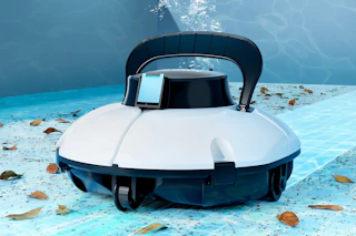 lifestyle image of a pool cleaner in the bottom of a pool