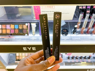 hand holding Anastasia Beverly Hills liquid lipstick