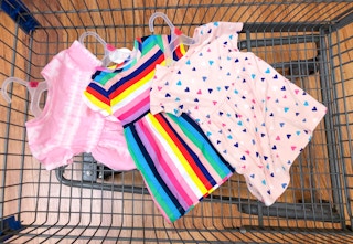 wonder nation baby dresses in walmart cart with floor as background
