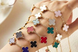 Clover 18k gold bracelet in multiple colors on hand