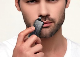 a person using a nose trimmer