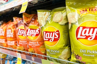 Shelf with multiple varieties of Lays potato chips