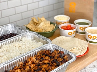 qdoba family meal on kitchen counter