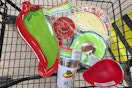 cinco de mayo party supplies in a cart