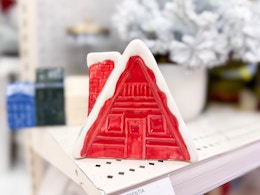 ceramic candle holder sitting on a target shelf